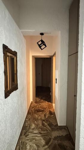 an empty room with a hallway with a ceiling at Medusa apartments in Amoudara Herakliou