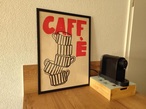 a picture of a sign next to a printer at Tiny Loft Hunsrück in Sohren