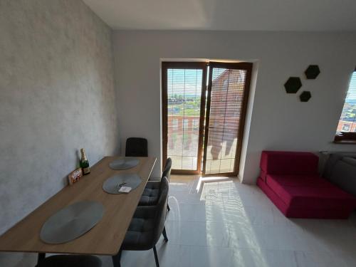 Coin salon dans l'établissement Tatragolf Mountain Resort Apartment