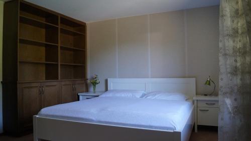 Cama o camas de una habitación en Hotel Alpen Arnika