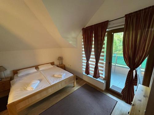 Postel nebo postele na pokoji v ubytování Cottage on Una