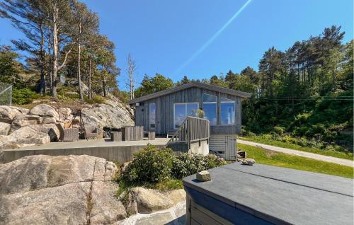 a tiny house on the side of a mountain at 2 Bedroom Amazing Home In Mandal in Mandal