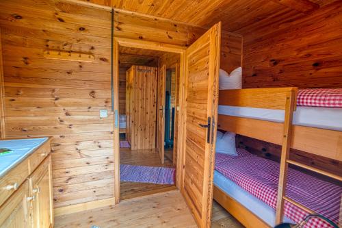 Ένα ή περισσότερα κρεβάτια σε δωμάτιο στο Ferienhaus Gustl
