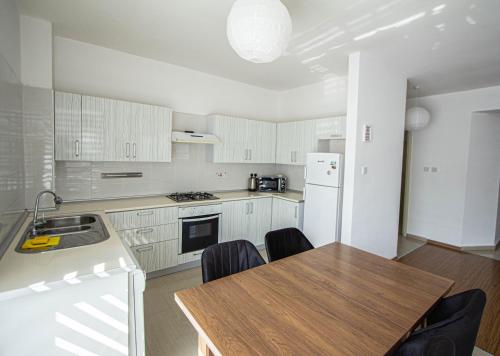 Una cocina o zona de cocina en Rix Palm Apartments
