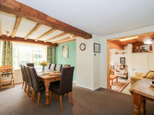 a dining room with a table and chairs at The Laurels in Bishops Castle
