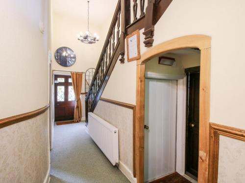 a hallway of a house with a stairway at The Laurels in Bishops Castle