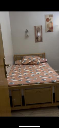 a bed in a bedroom with at Chalet in Ain Sokhna