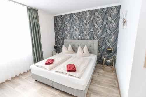 Postel nebo postele na pokoji v ubytování Second Home Hotel