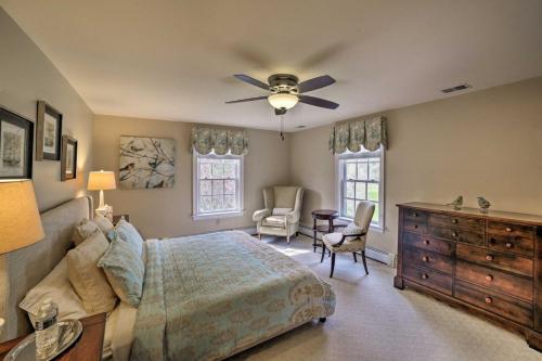 a bedroom with a bed and a ceiling fan at Events and Concierge, 6BR Heated Pool Near Wineries in Hume