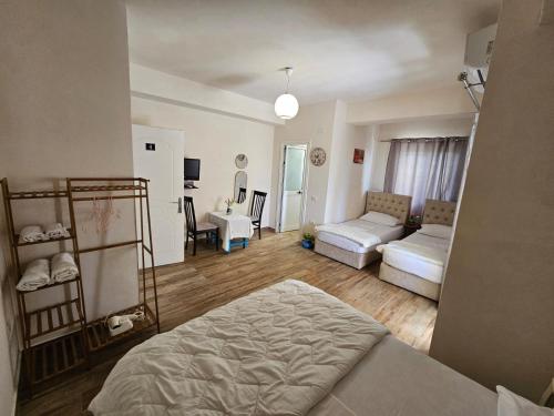 Katil atau katil-katil dalam bilik di Joyous Apartments