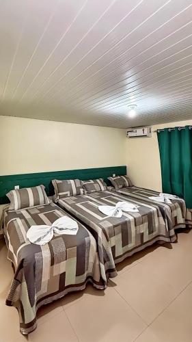 Postel nebo postele na pokoji v ubytování Santorini Hotel