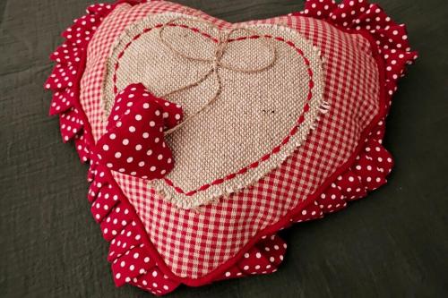 a red and white cloth with a heart on it at Le Loft de Genas - la Bastide, le Chalet, le Loft, le Mas, la Paillote in Genas