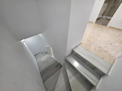 an overhead view of a staircase in a house at Chalet Playamar 300m de la playa in Torremolinos