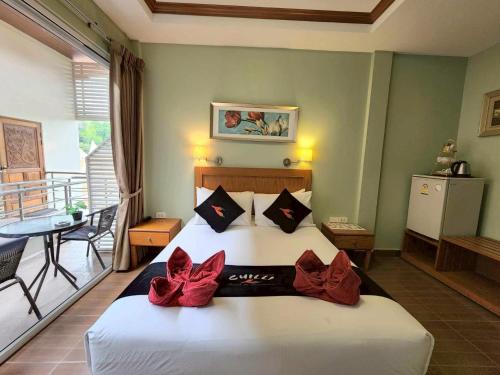 Ένα ή περισσότερα κρεβάτια σε δωμάτιο στο Chilli Hotel&Restaurant