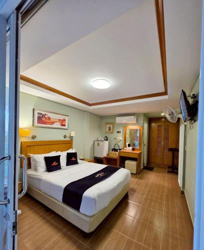 Ένα ή περισσότερα κρεβάτια σε δωμάτιο στο Chilli Hotel&Restaurant