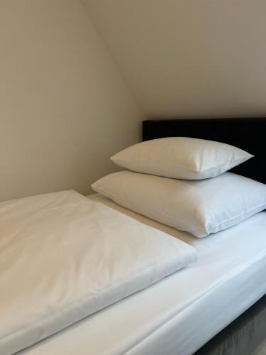 Letto o letti in una camera di Stadt Villa Boutiquehotel