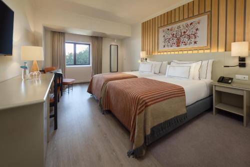 Postel nebo postele na pokoji v ubytování Meliá Castelo Branco