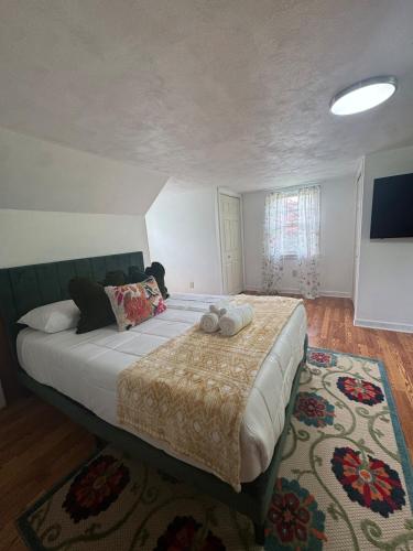 Ένα ή περισσότερα κρεβάτια σε δωμάτιο στο Cozy Home