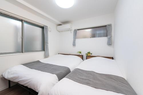 Ένα ή περισσότερα κρεβάτια σε δωμάτιο στο KR family terrace