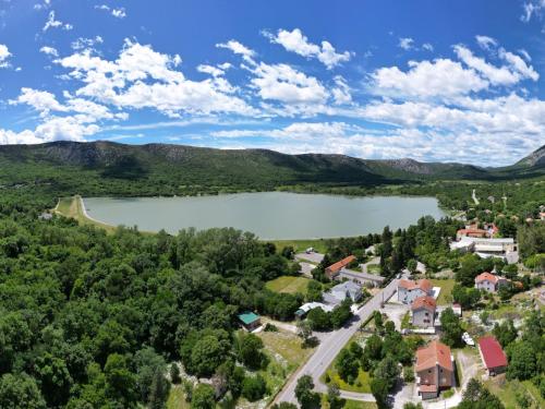 an aerial view of a small town with a lake at Holiday Home Manea by Interhome in Tribalj