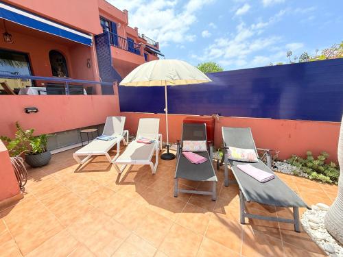 Ban công/sân hiên tại Beach and golf 4 Bedroom Holiday Home