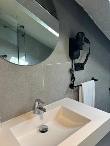 Koupelna v ubytování U-Hotel Aduana Ribadeo