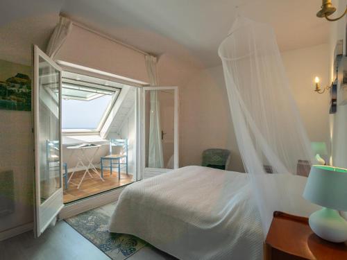 Katil atau katil-katil dalam bilik di Apartment Belle Vue Mer by Interhome