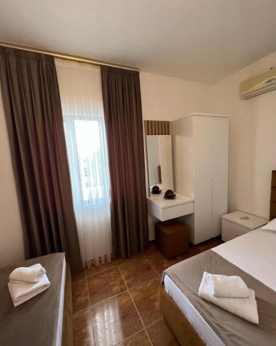 Llit o llits en una habitació de Hotel Vacanza