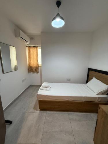 Postel nebo postele na pokoji v ubytování 4-Bedroom Apartment in Pietà P4