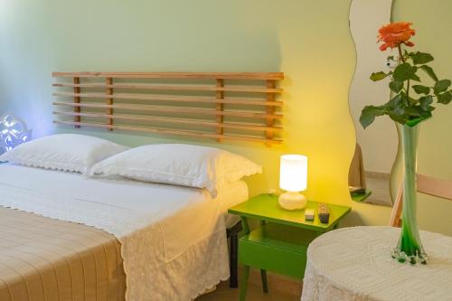 Ένα ή περισσότερα κρεβάτια σε δωμάτιο στο Casa Buongiorno Salento