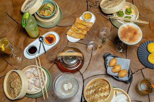 a table topped with lots of different types of food at Courtyard by Marriott Houston Rice University in Houston