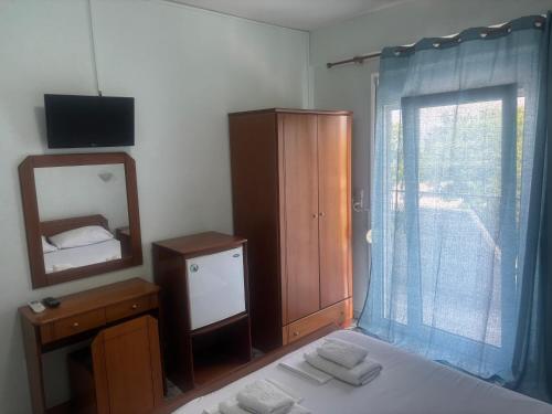Postel nebo postele na pokoji v ubytování Indigo sea view rooms