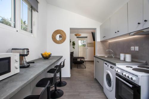 Η κουζίνα ή μικρή κουζίνα στο GK Home Apartment I part of Gk Fitness Club