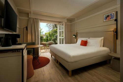 La Bastide de Mougins, a Tribute Portfolio Hotelにあるベッド