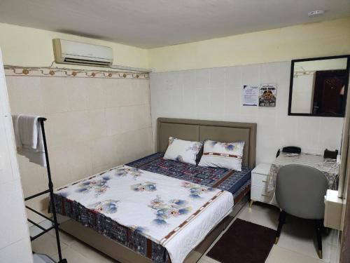 Postel nebo postele na pokoji v ubytování Molla Hotel