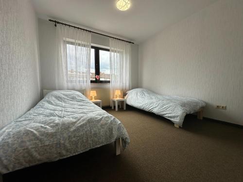 Ένα ή περισσότερα κρεβάτια σε δωμάτιο στο Apartment Ruhepause III Ruhig & Geräumig