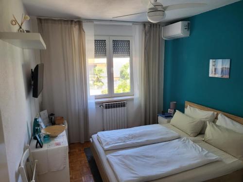 Postel nebo postele na pokoji v ubytování Villa Csipak