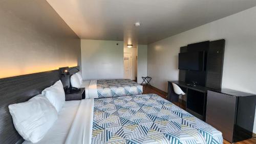 Postel nebo postele na pokoji v ubytování Motel 6-Ennis, TX