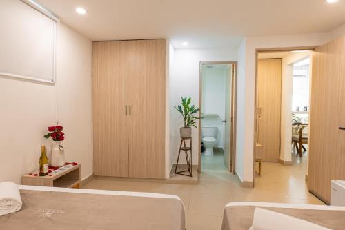 Postel nebo postele na pokoji v ubytování Mishka Hotel Boutique Habitación 102