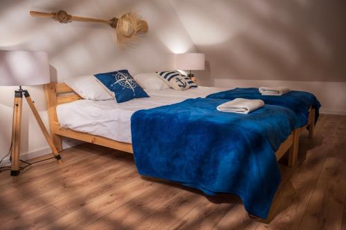 Ένα ή περισσότερα κρεβάτια σε δωμάτιο στο Mila Morska Kopalino