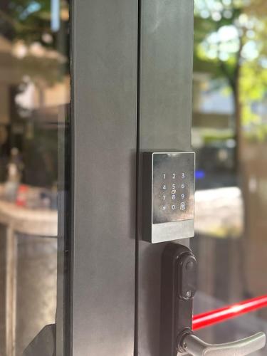 a close up of a door with a control panel at Hotel Eureka in Rimini