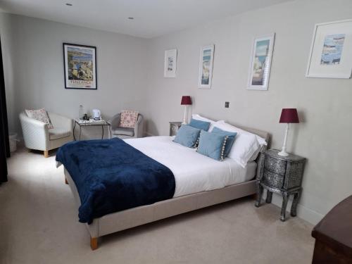 Postel nebo postele na pokoji v ubytování The Courtyard Mews