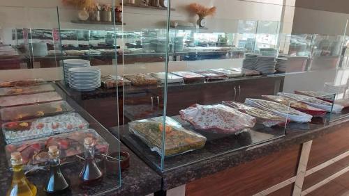 a display case with many different types of food at Sare Hotel in Erdek