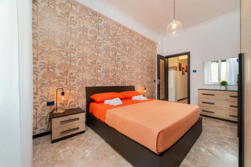 Postel nebo postele na pokoji v ubytování Salerno Centro Holiday House