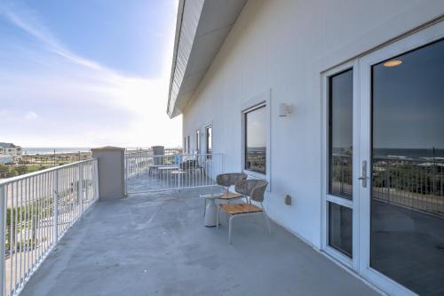 a balcony with a view of the ocean at Hotel Indigo Orange Beach - Gulf Shores by IHG in Gulf Shores