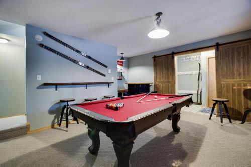 a room with a pool table in a room at Moose Tracks Cabin Hot Tub 1 Mile To Lake in Lake Harmony