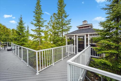 a white gazebo on a wooden deck at 45 Degrees North - Tobermory in Tobermory