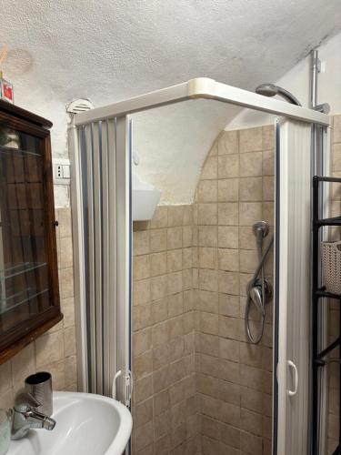 a bathroom with a shower and a sink at Il Caratteristico -centro storico- "Anno 1887" in Capistrello