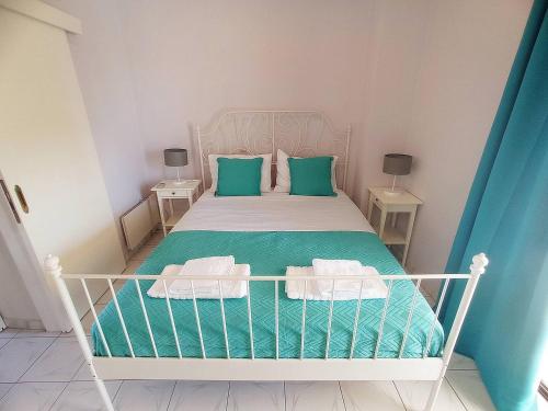 Postel nebo postele na pokoji v ubytování Twin Pearls
