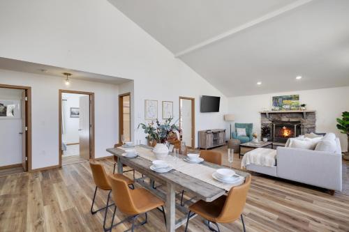 a living room with a table and chairs and a couch at Serene Escape At Big Bass Lake & Pool Access in Clifton